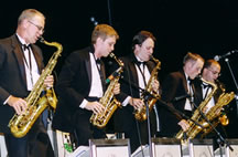 saxophones performing with kim kelly orchestra